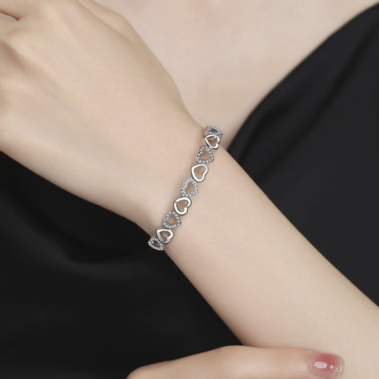 Amy and Annette 14K White Gold Hearts Bangle Adjustable Bracelet with crystals from Swarovski in 14K White Gold Plated