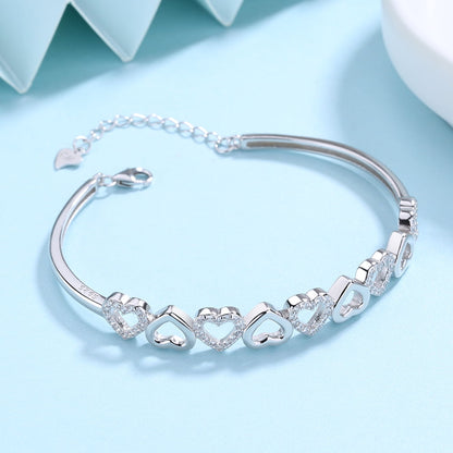 Amy and Annette 14K White Gold Hearts Bangle Adjustable Bracelet with crystals from Swarovski in 14K White Gold Plated